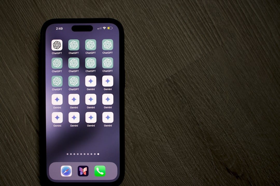A sleek Apple device alongside an OpenAI logo, symbolizing the emerging competition in technology.