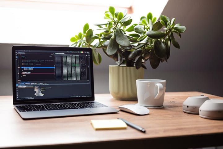 A sleek laptop displaying the Gemini Spark interface, showcasing AI tools and features for continuous productivity.