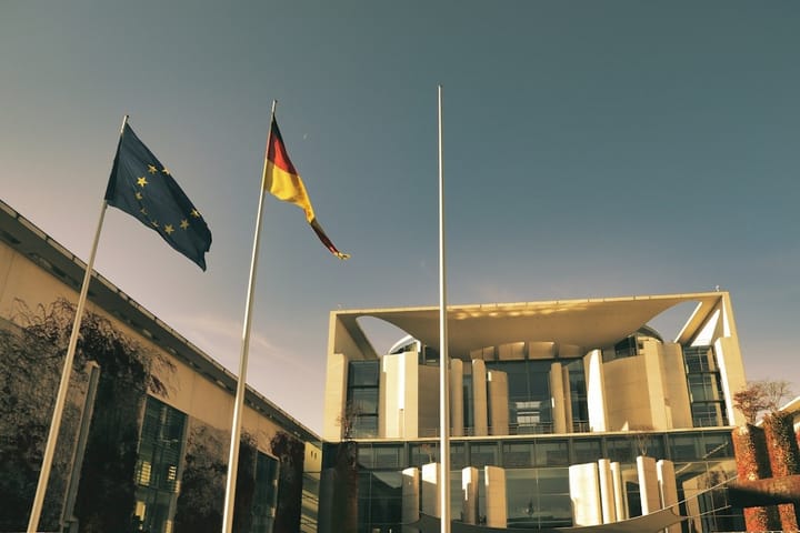 European Union officials discussing tech sovereignty strategies at a conference, highlighting collaboration and innovation in technology procurement.