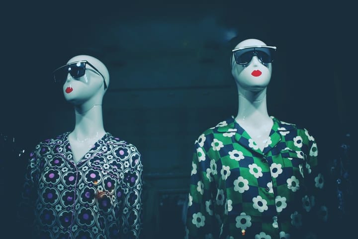 A model showcases innovative adversarial clothing designed to enhance privacy and security in public spaces.